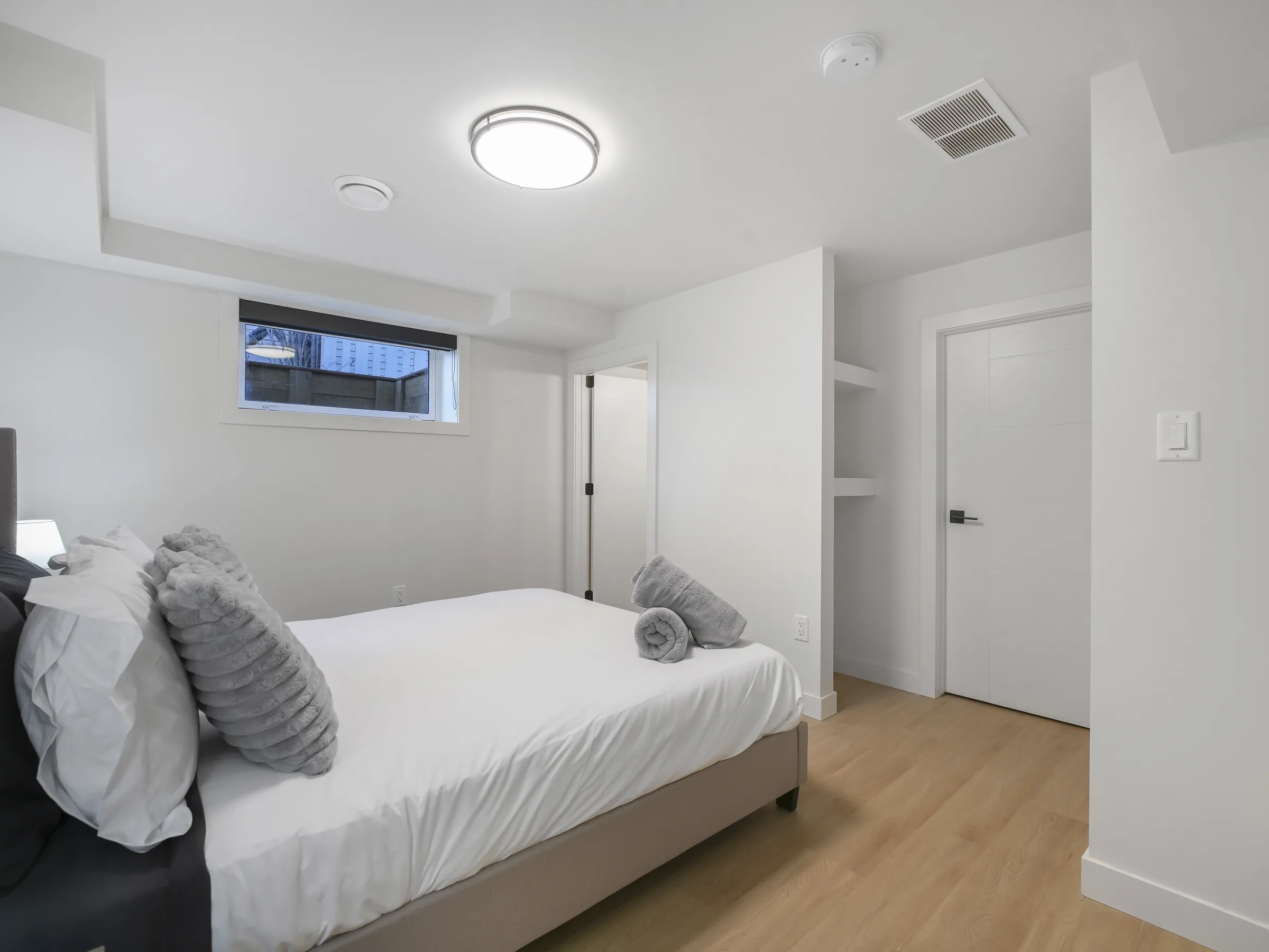 Third bedroom, alternate angle with window and closet