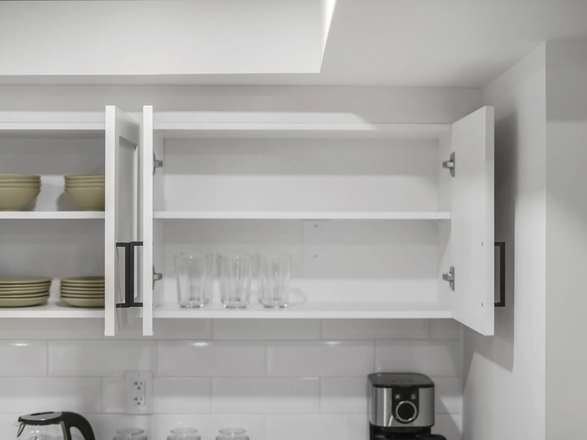 Cabinet with mugs and glasses, alternate angle