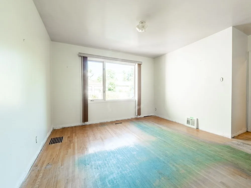 Before renovation, unfinished basement space