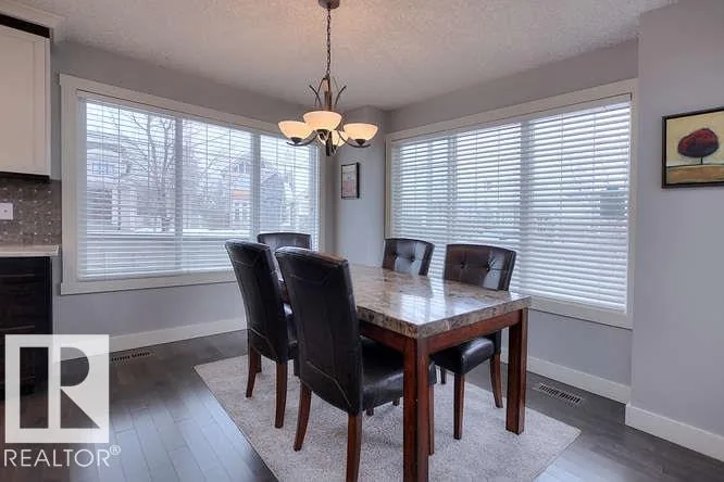 Before renovation, breakfast nook with a three-window bay