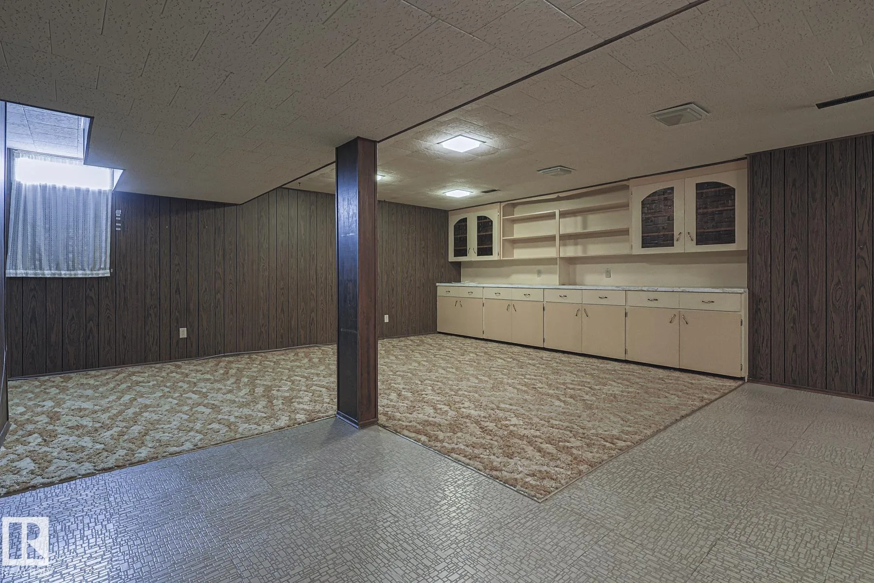 Before, primary bedroom, oak-strip floors under carpet