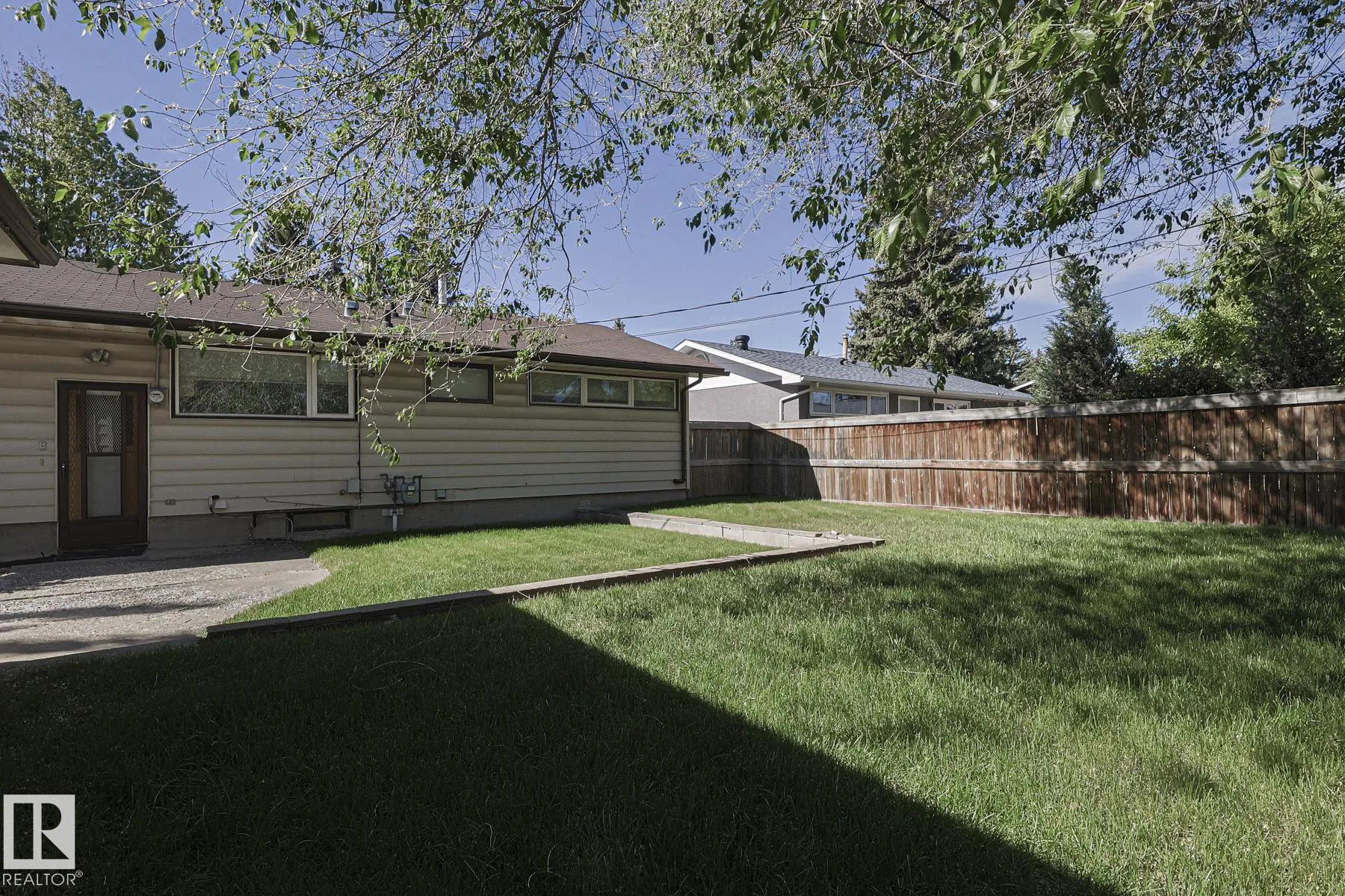 Before, rear elevation with original deck