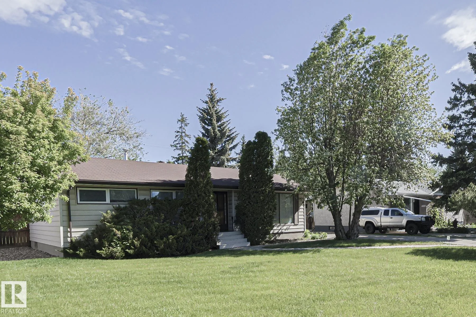 Before, backyard with original detached garage