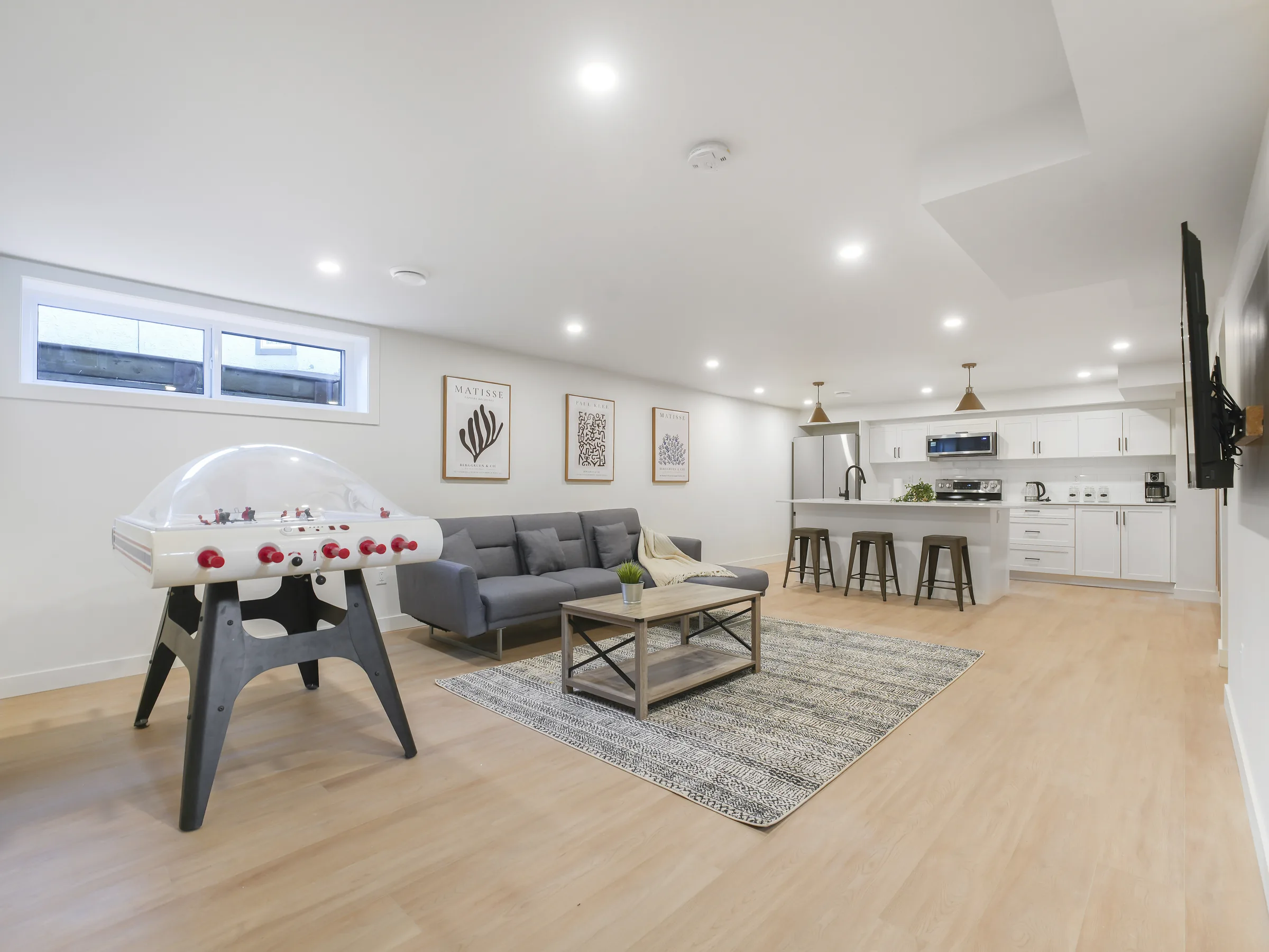 Basement, open-plan rec room and kitchenette